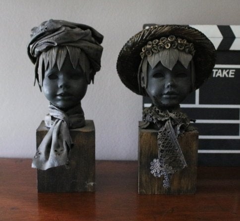 2 beelden in papier-maché BC, Ophalen