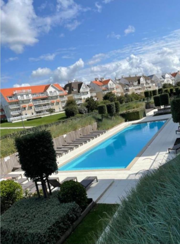 Vakantie appartement Nieuwpoort met garage fietsen zwembad