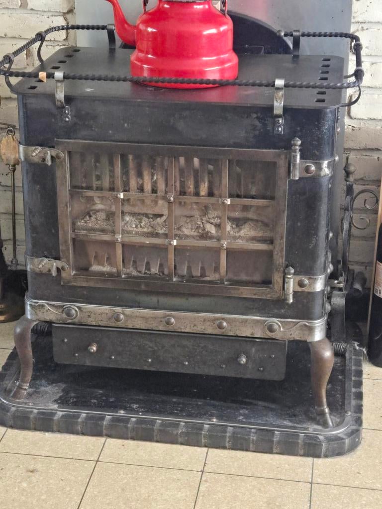 Houtkachel zwart kan ook met kolen, Enlèvement