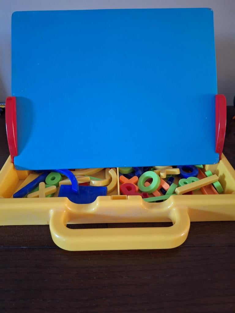 Magneetbord in draagkoffer, Enlèvement