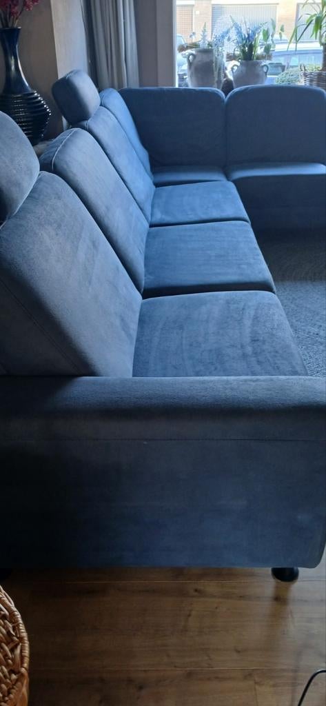 Blauwe hoekbank met relax functie en neksteunen, Ophalen