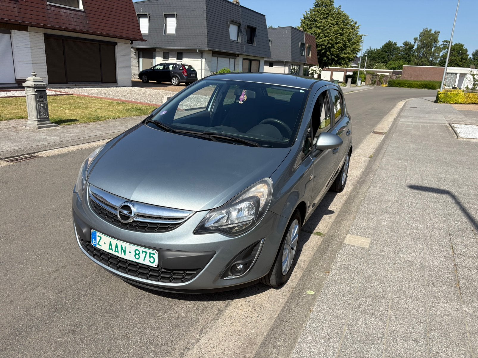 Opel Corsa Benzine 2014, Auto's, Voorwielaandrijving, Zwart, Leder en Stof, Bedrijf