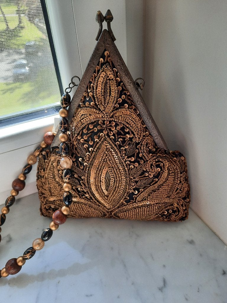 Sac doré, Ophalen, Zwart