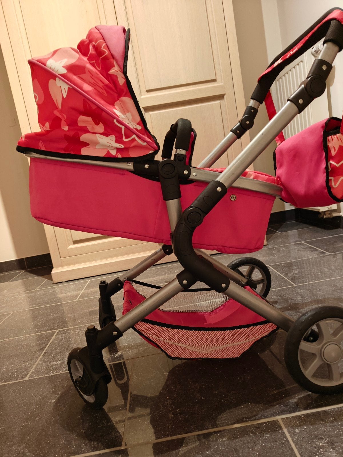 Bayer Design City Neo combi-poppenwagen, Ophalen