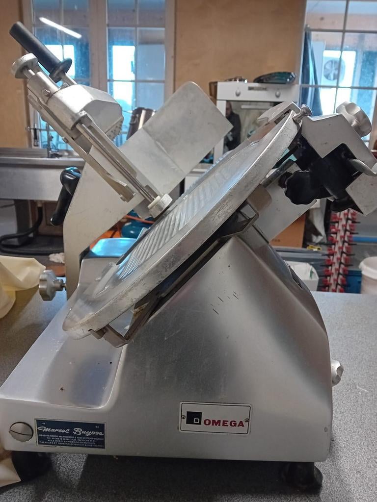 Omega  professionele snijmachine, Enlèvement