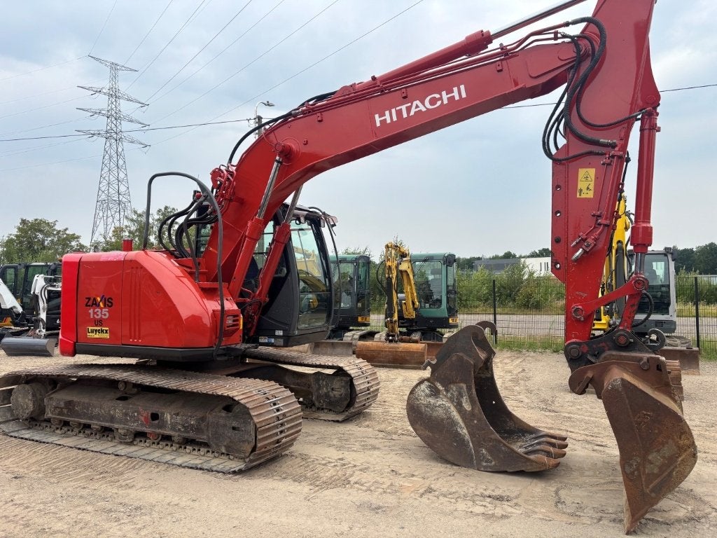 rupskraan Hitachi ZX135US-3, Ophalen, Graafmachine