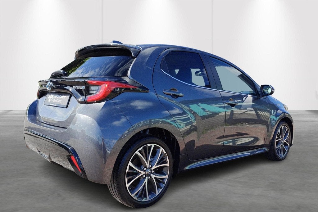 Toyota Yaris 1.5 VVT-i Hybrid Elegant e-CVT - 2 ans KARE inc, Autos, Toyota, Argent ou Gris, 116 ch, 450 kg, 5 portes