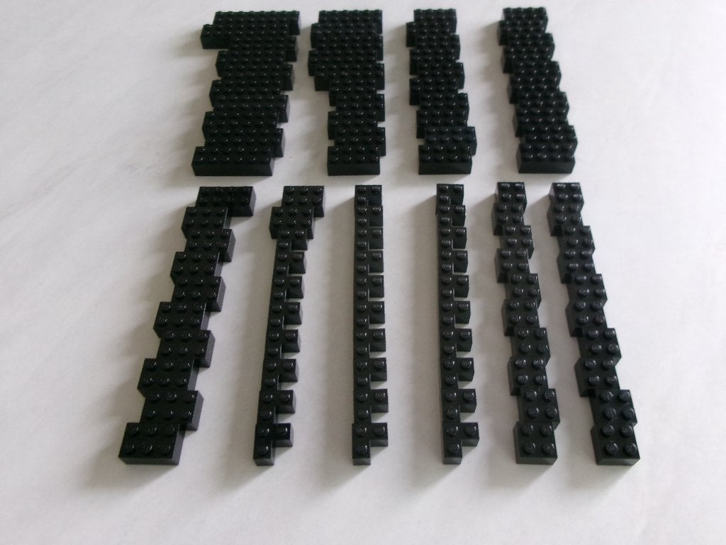 A 100 zwarte Lego 2x.. stenen, Gebruikt, Lego, Ophalen of Verzenden, Losse stenen