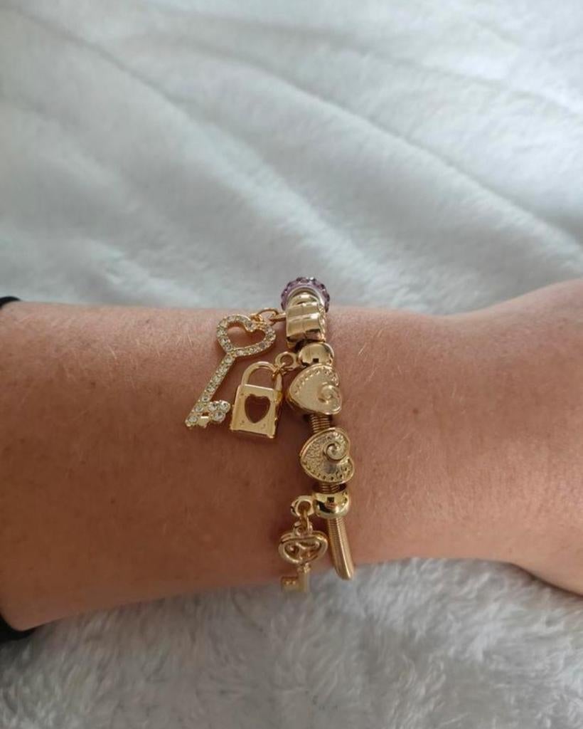 Gouden armband met slot en sleutel bedels, Ophalen of Verzenden