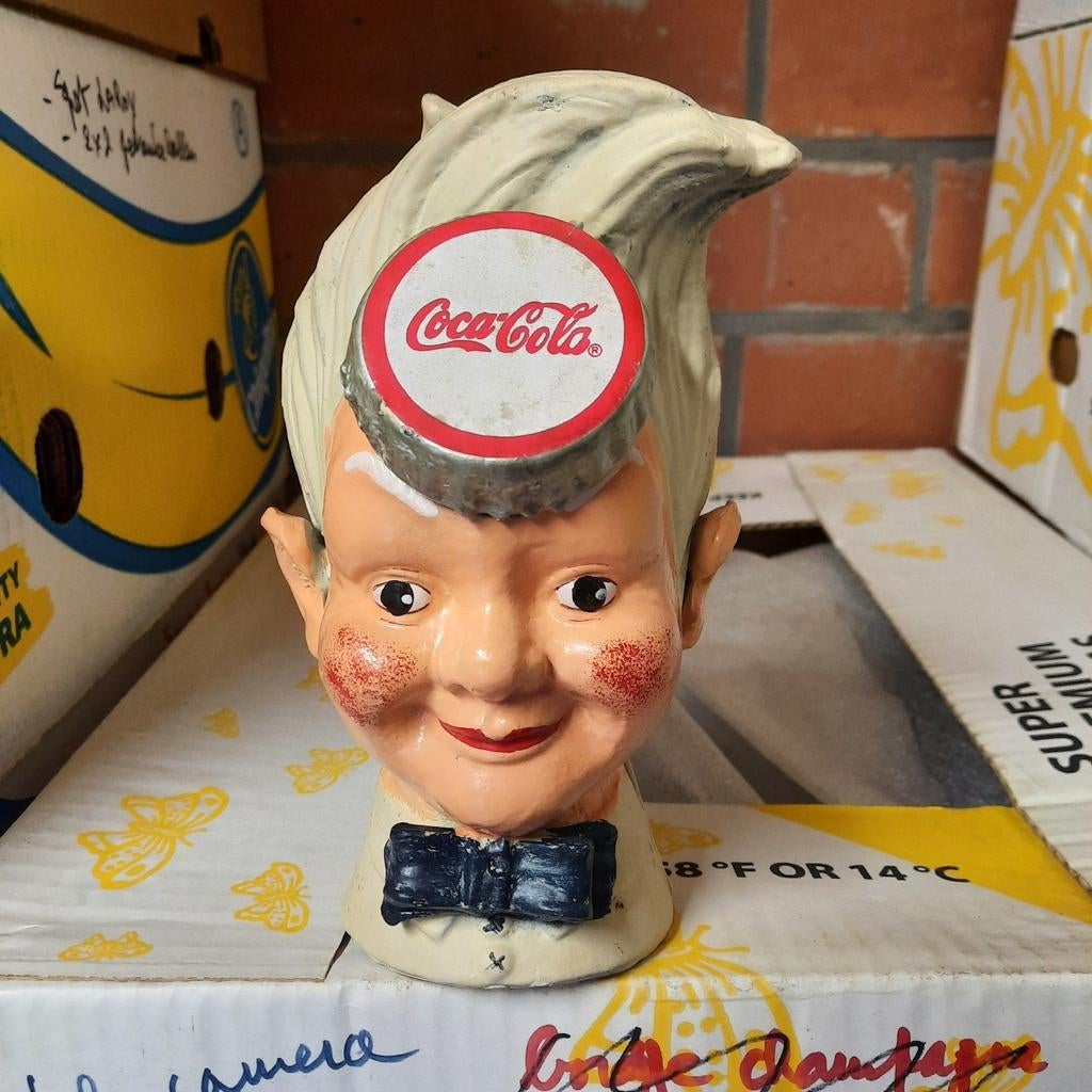 Tête de coca cola en fonte. Original. Tirelire., Enlèvement ou Envoi