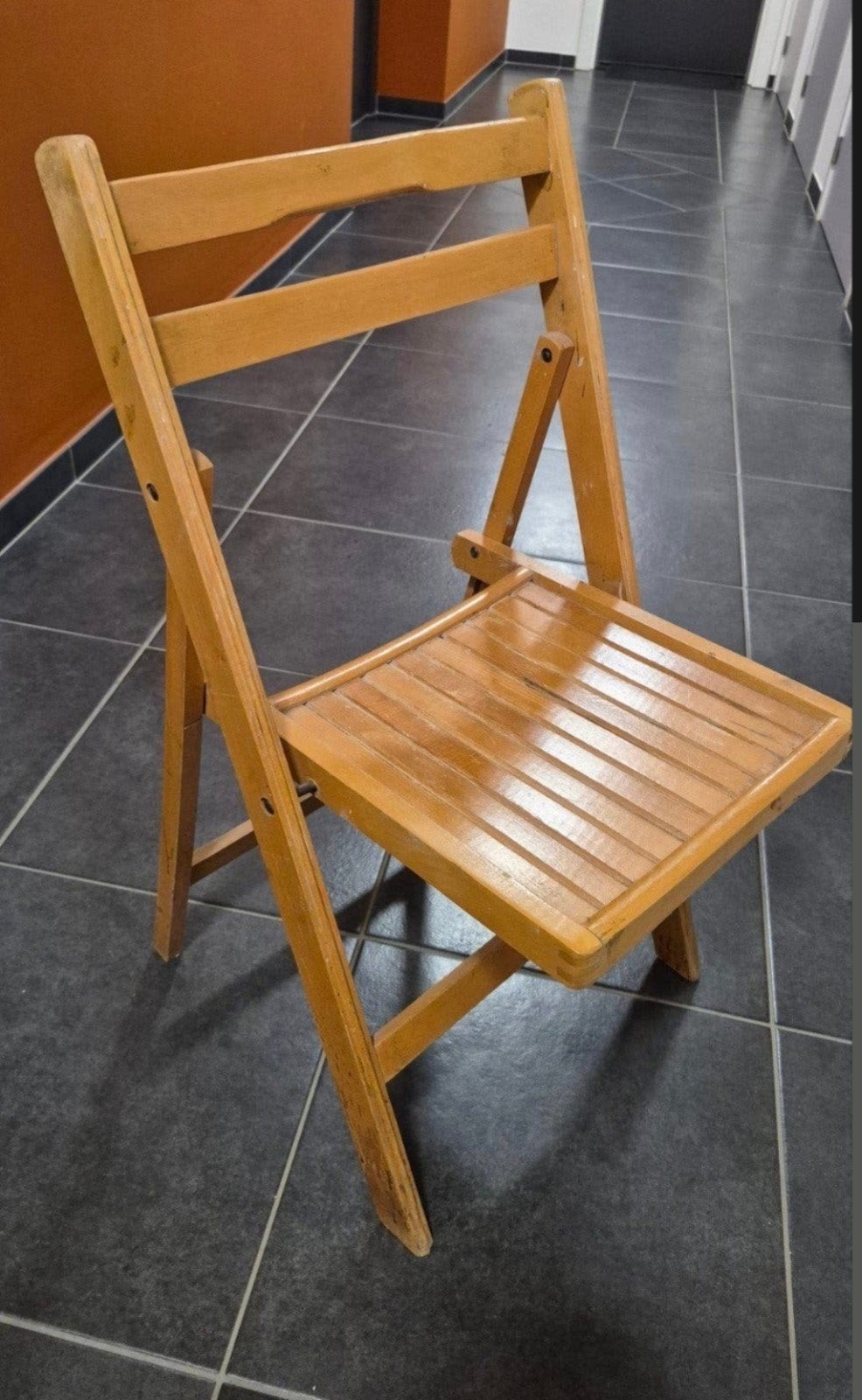 opvouwbare houten stoel, Ophalen