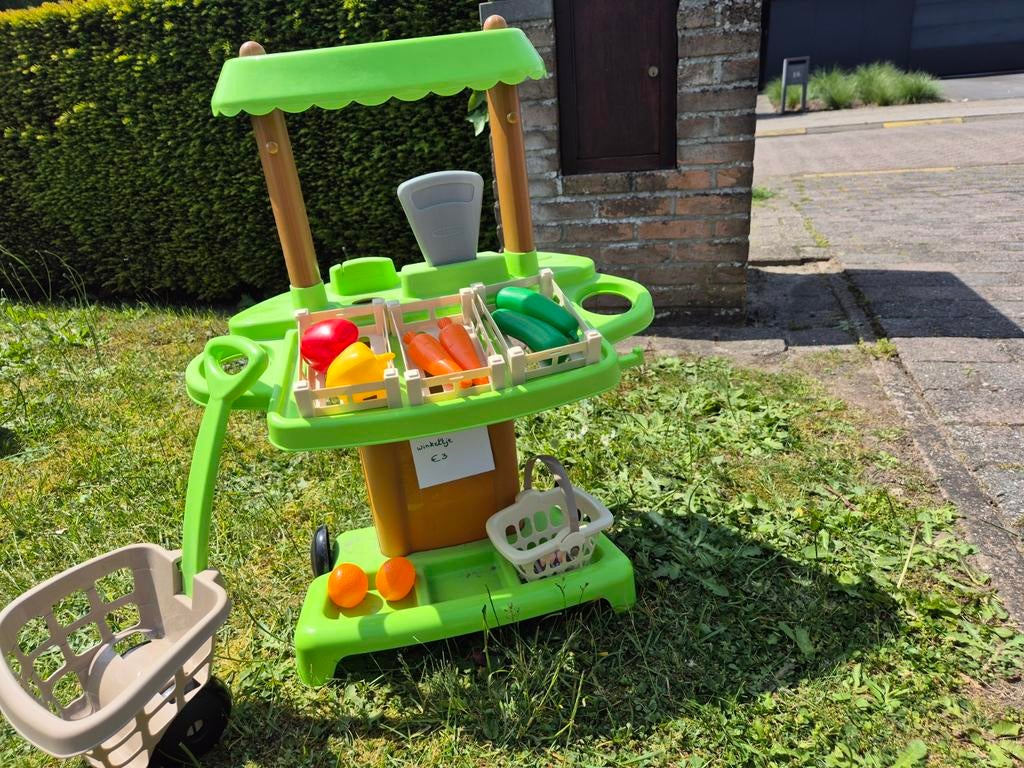 Winkeltje met mandje en karretje, Ophalen