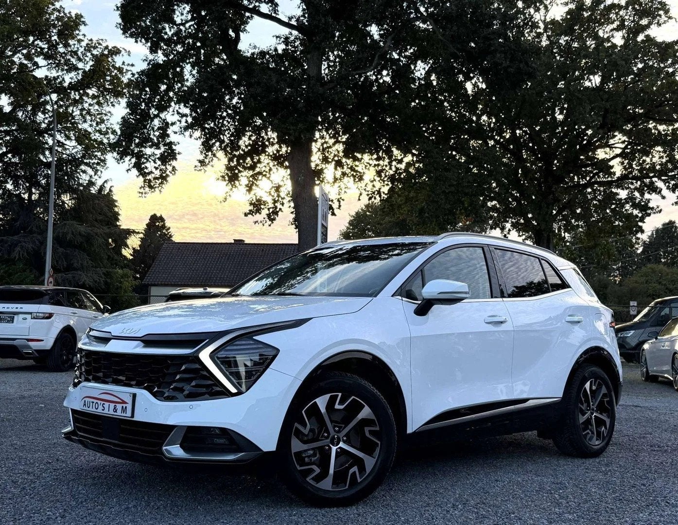 Kia Sportage 1.6 T-GDi MHEV 2023 Lijnass. Camera Carplay Gar, Auto's, Automaat, Gebruikt, 4 cilinders, Wit