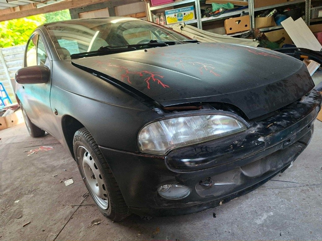 opel tigra a  project, Auto's, Opel, Voorwielaandrijving, 4 zetels, Stof, Zwart