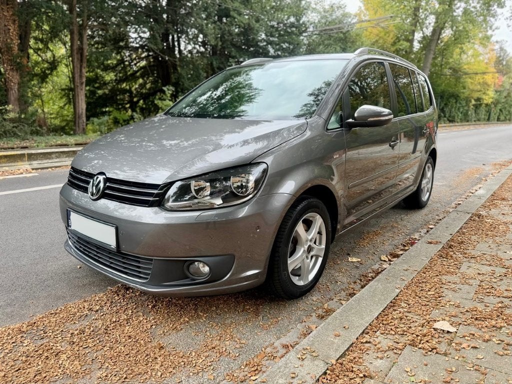 2014 VW Touran 1.2 TSI Cup edition 7 PLAATSEN, Auto's, Voorwielaandrijving, Euro 5, Zwart, 4 cilinders