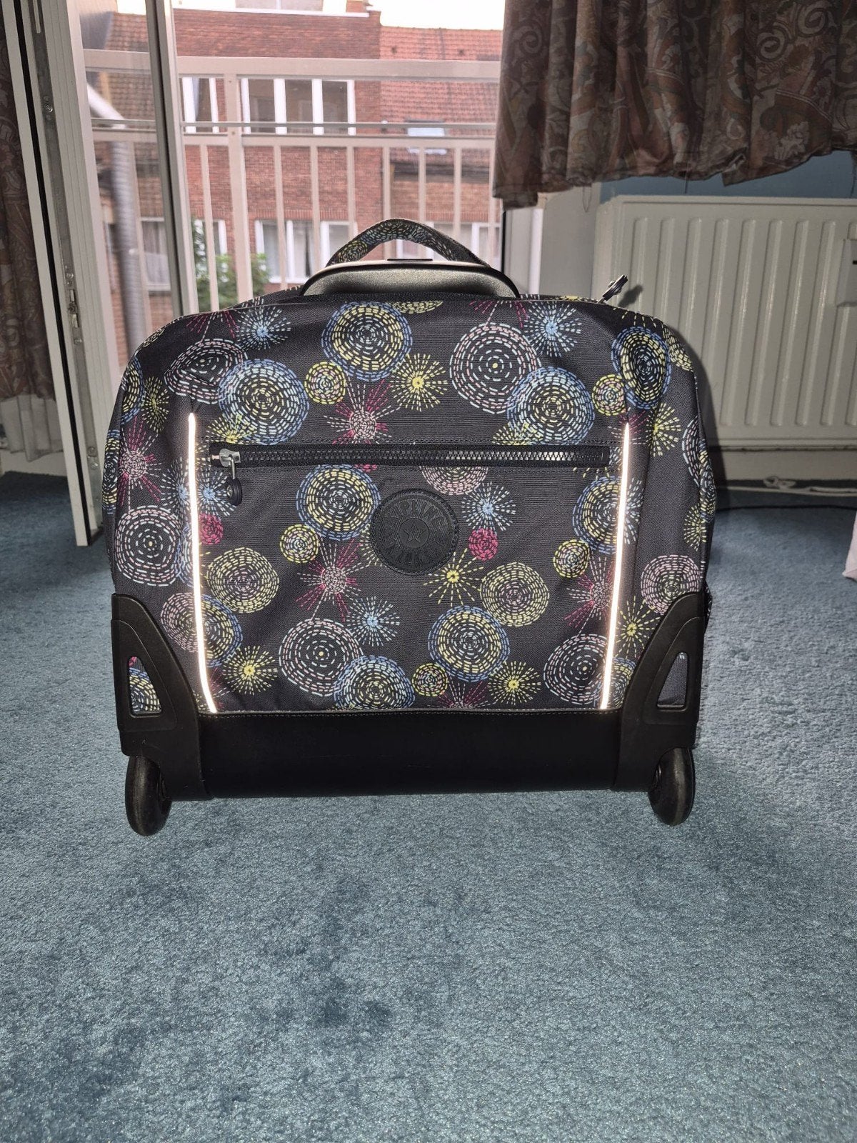 "Kipling" rugzak met wielen., Ophalen