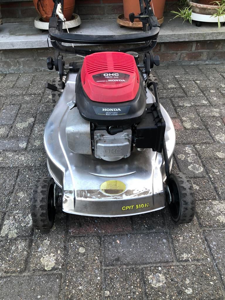 Grasmachine met honda motor, Ophalen