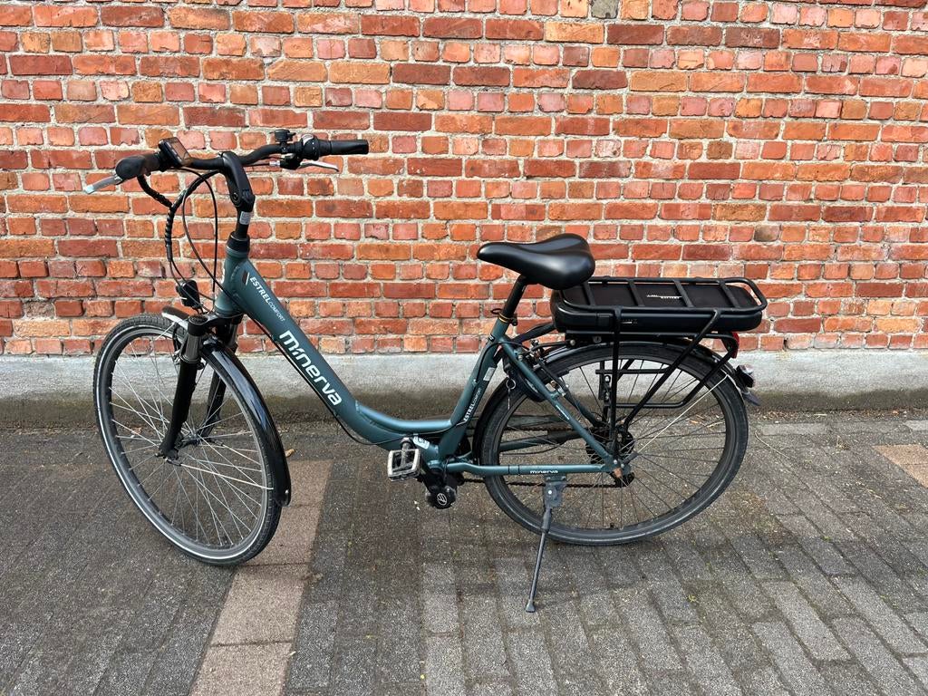 Elektrische fiets Minerva, Ophalen, Gebruikt, 30 tot 50 km per accu, Overige merken