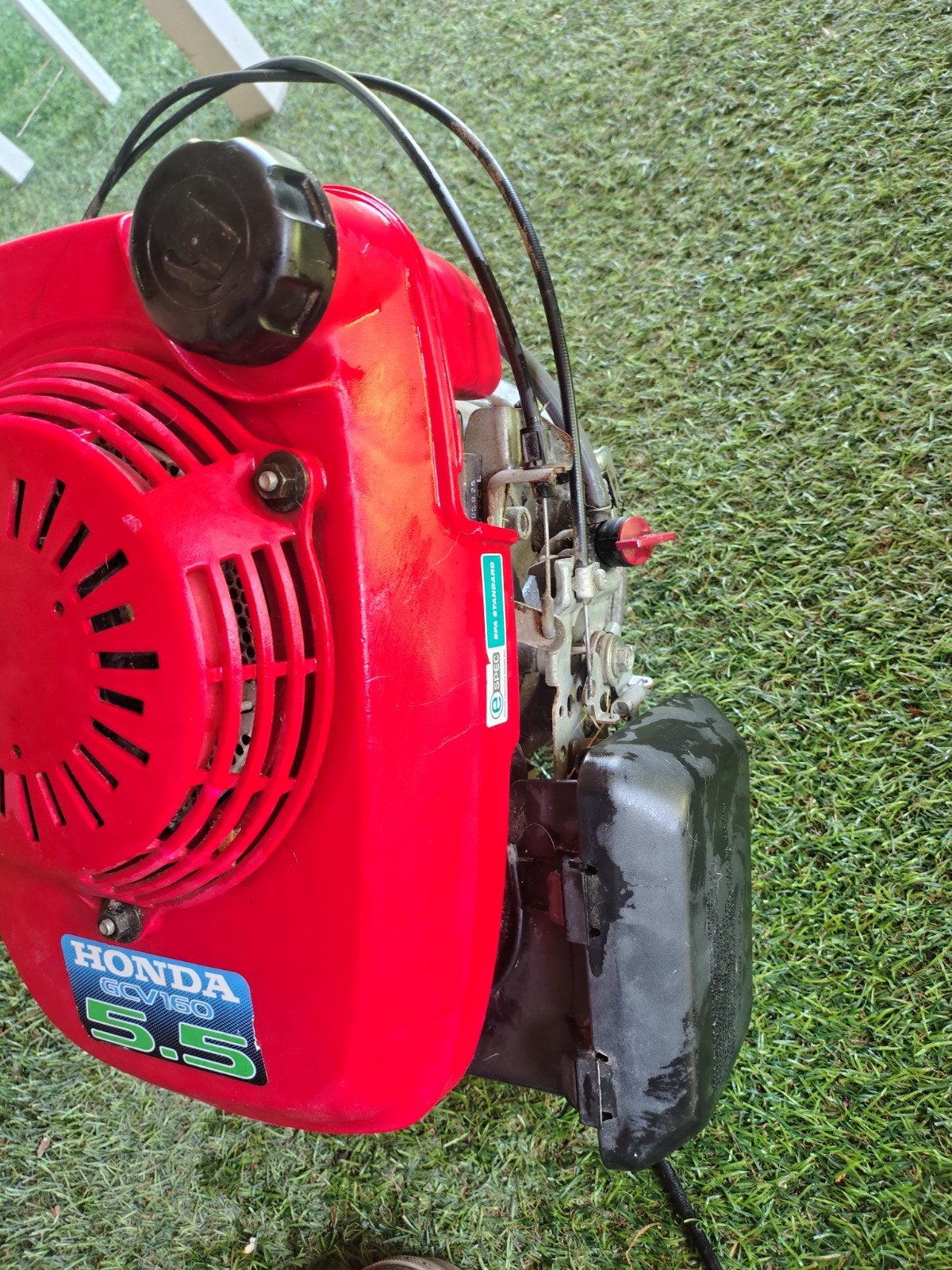 Honda moter van een gras maaier, Enlèvement