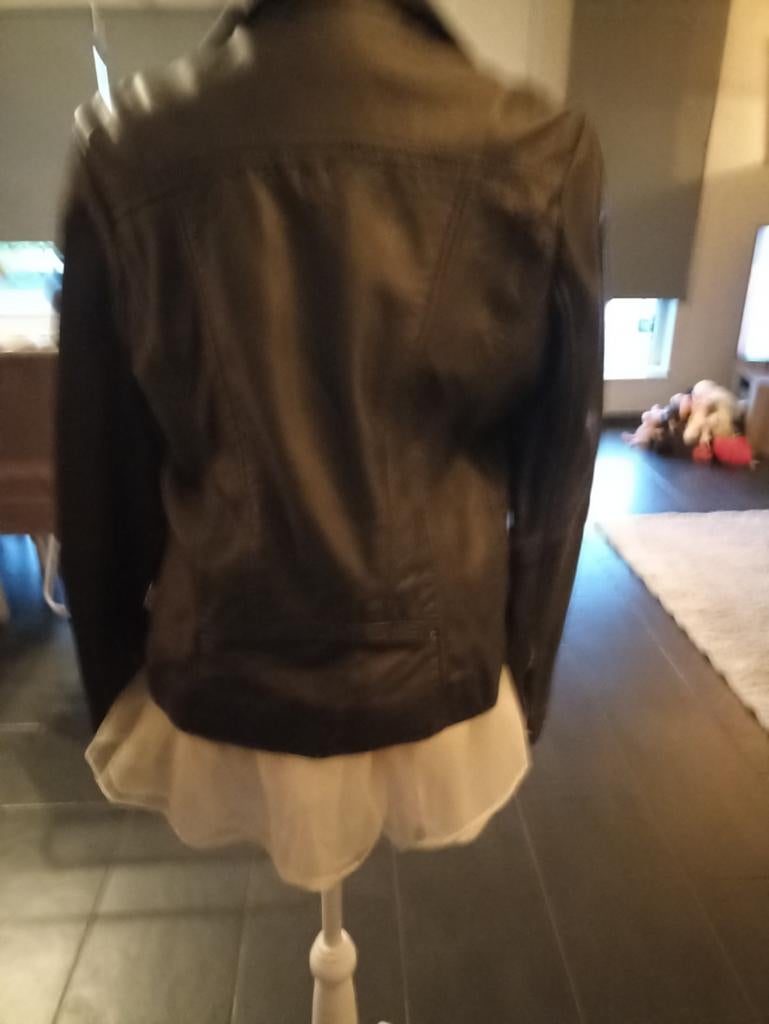 Leren dames vest lee cooper, Enlèvement