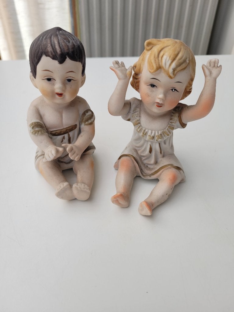 2 beeldjes in biscuit, Enlèvement, Utilisé