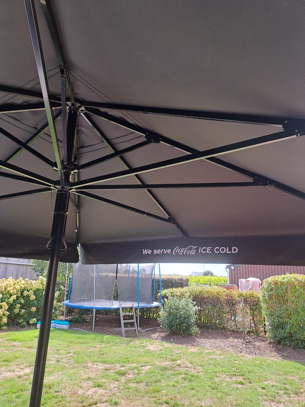 grote parasol Coca-Cola, Jardin & Terrasse, Enlèvement