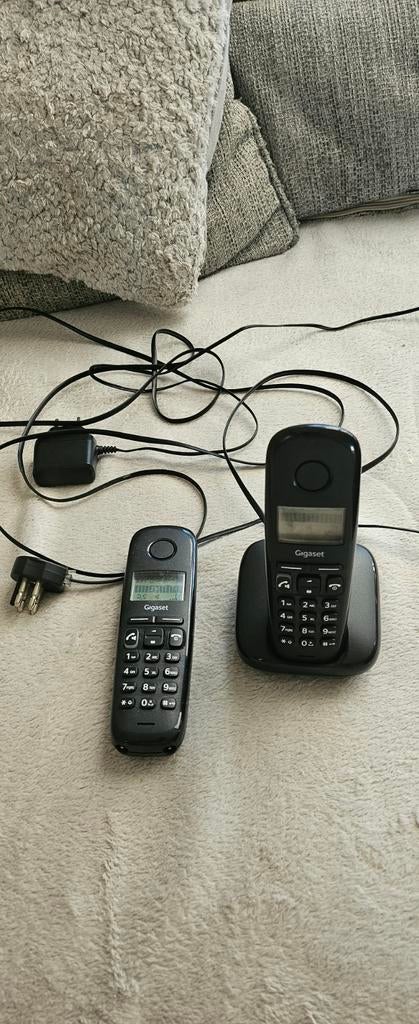 2 duo huis telefoons, Ophalen