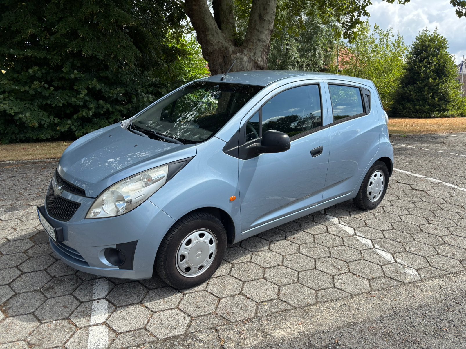Propere Chevrolet Spark benzine met keuring en garantie., Auto's, Chevrolet, Voorwielaandrijving, Dealer onderhouden, Stof, Zwart