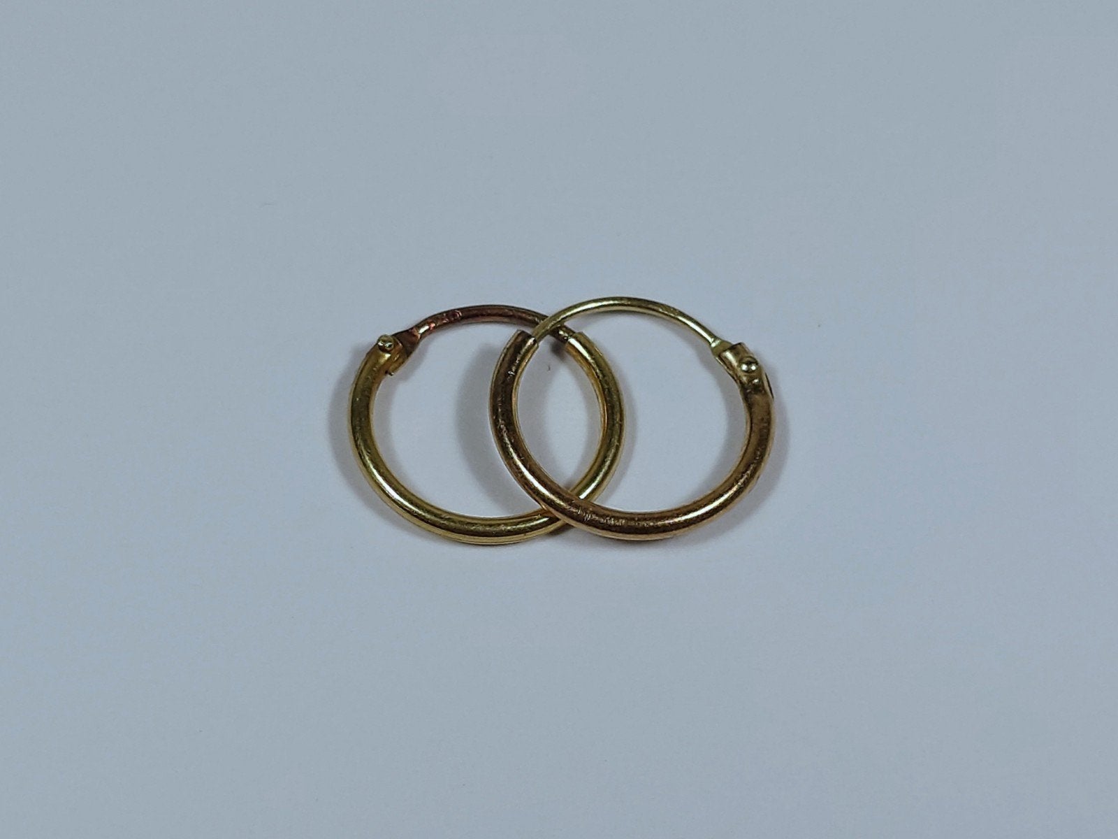 Paar 14 karaat gouden oorbellen, Hangers, Ophalen of Verzenden, Zo goed als nieuw, Goud