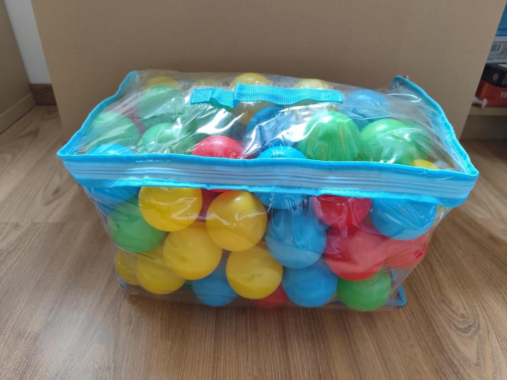 Zakje met gekleurde ballen, Ophalen