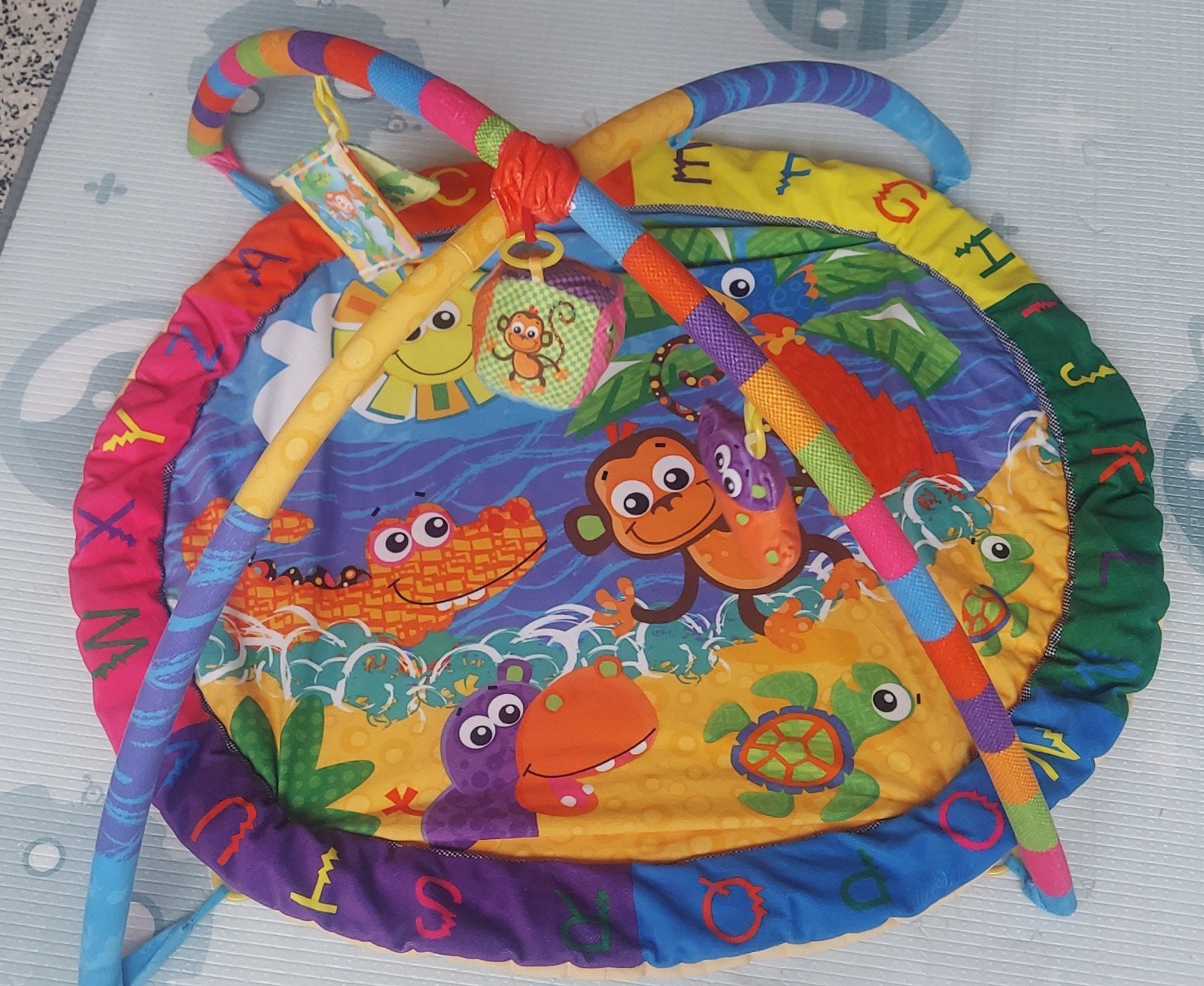 speelmat met speelboog, Ophalen