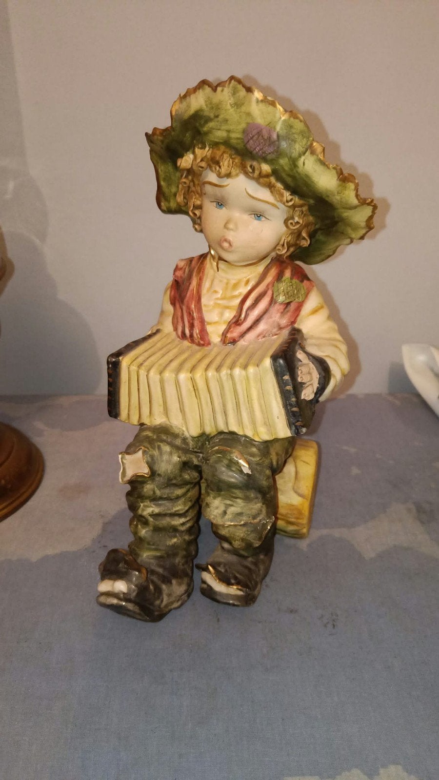 Jongen met accordeon, Verzamelen, Ophalen