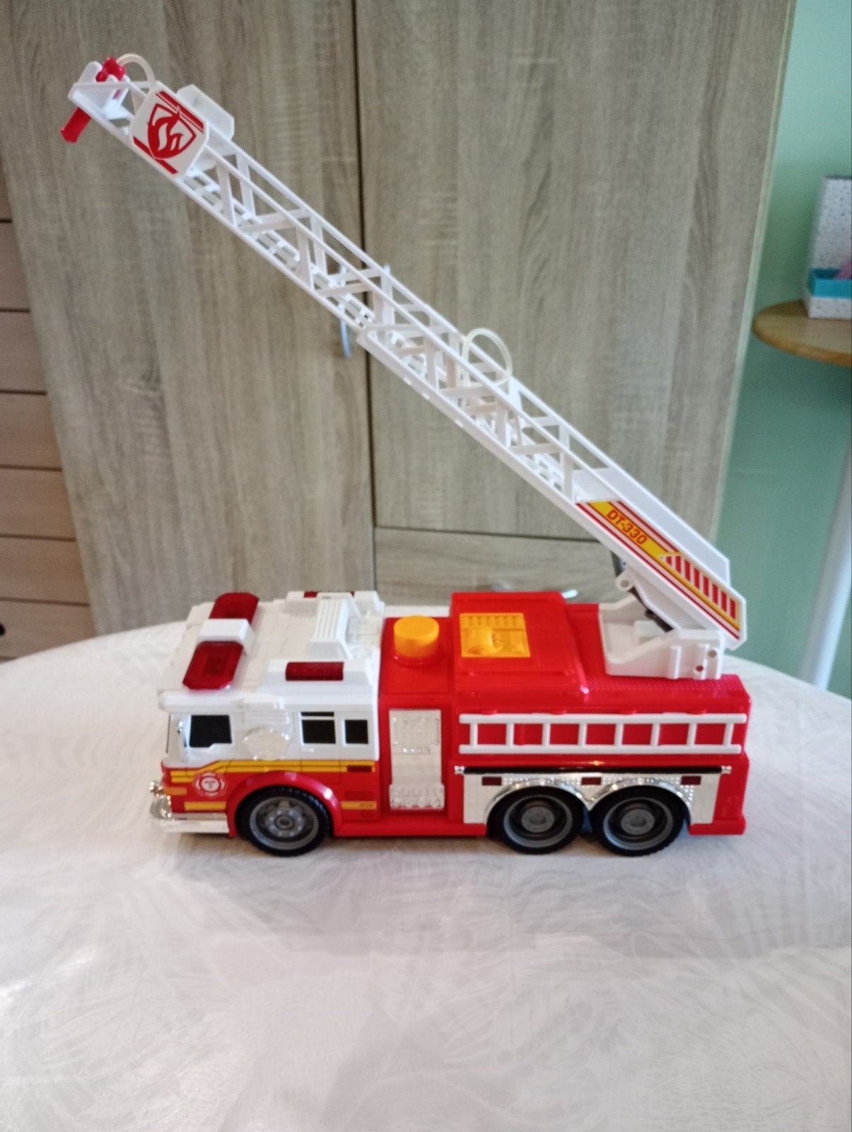Grand camion de pompiers Dickie Toys (Son, lumière et eau) –, Ophalen