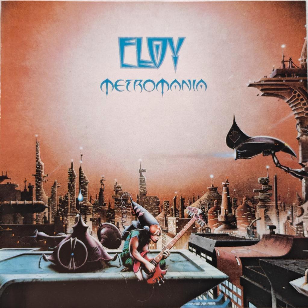 ELOY - Metromania (CD), CD & DVD, CD | Rock, Enlèvement ou Envoi, Comme neuf, Progressif