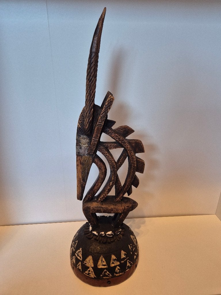Coiffe en bois africaine encien, Enlèvement