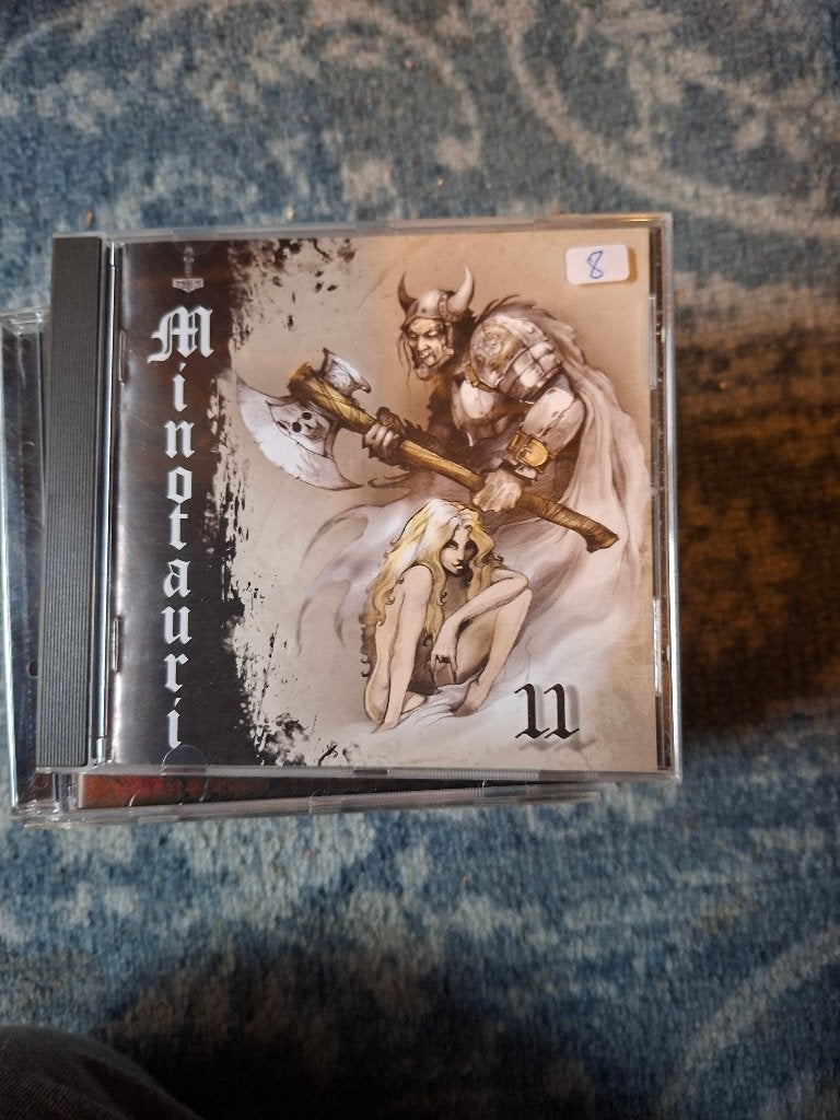 cd - minotauri - II, Ophalen of Verzenden, Zo goed als nieuw, Inclusief boekje, Doom metal