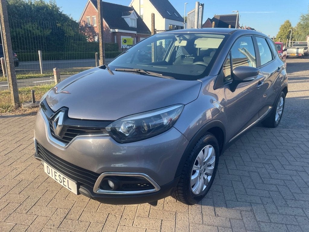 Renault Captur 1.5DCi van 08/2013 met 130000km!, Auto's, Voorwielaandrijving, Stof, Zwart, 4 cilinders