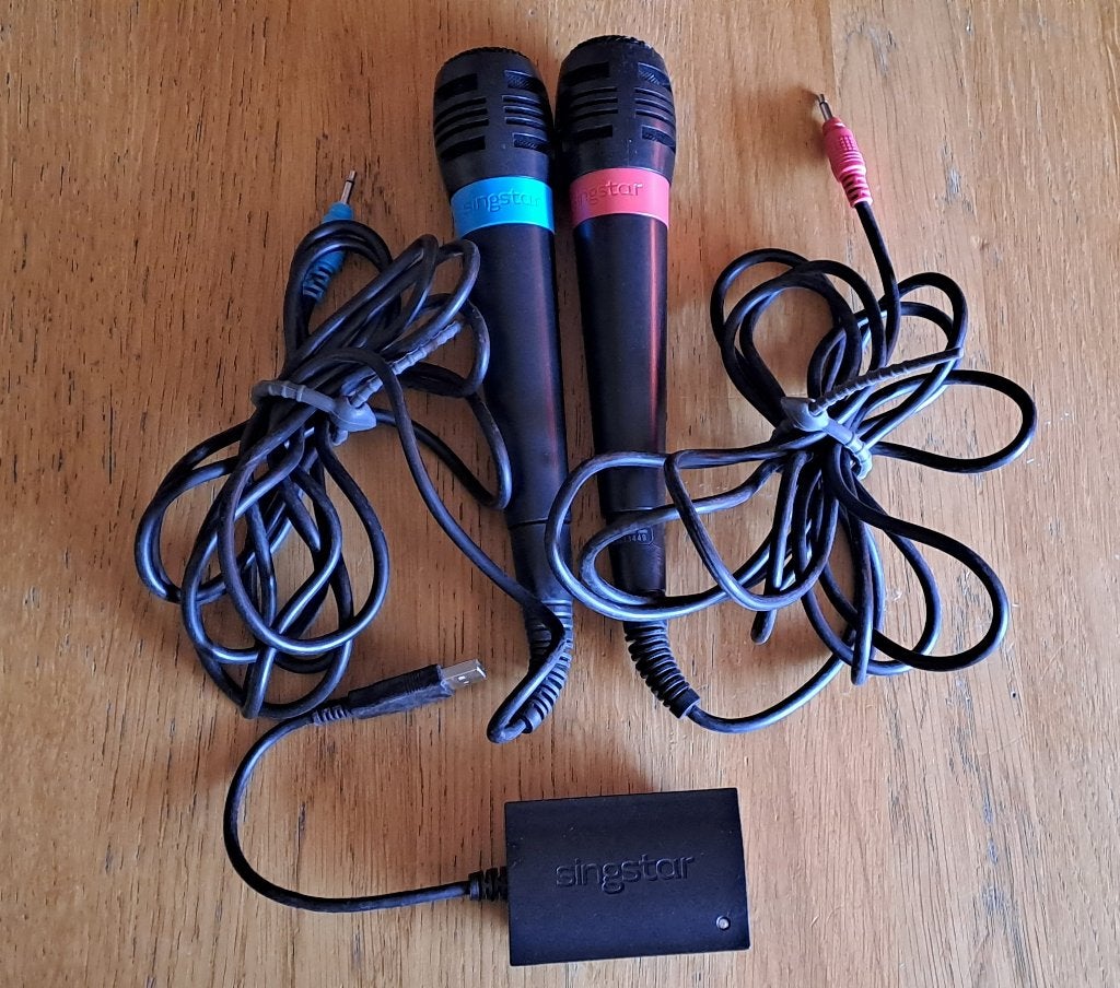 2x ORIGINELE SINGSTAR Microfoons en Koppelstuk, Games en Spelcomputers, Ophalen of Verzenden, Zo goed als nieuw