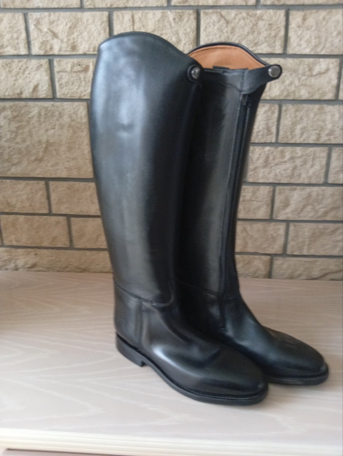 botte pour homme, Ophalen