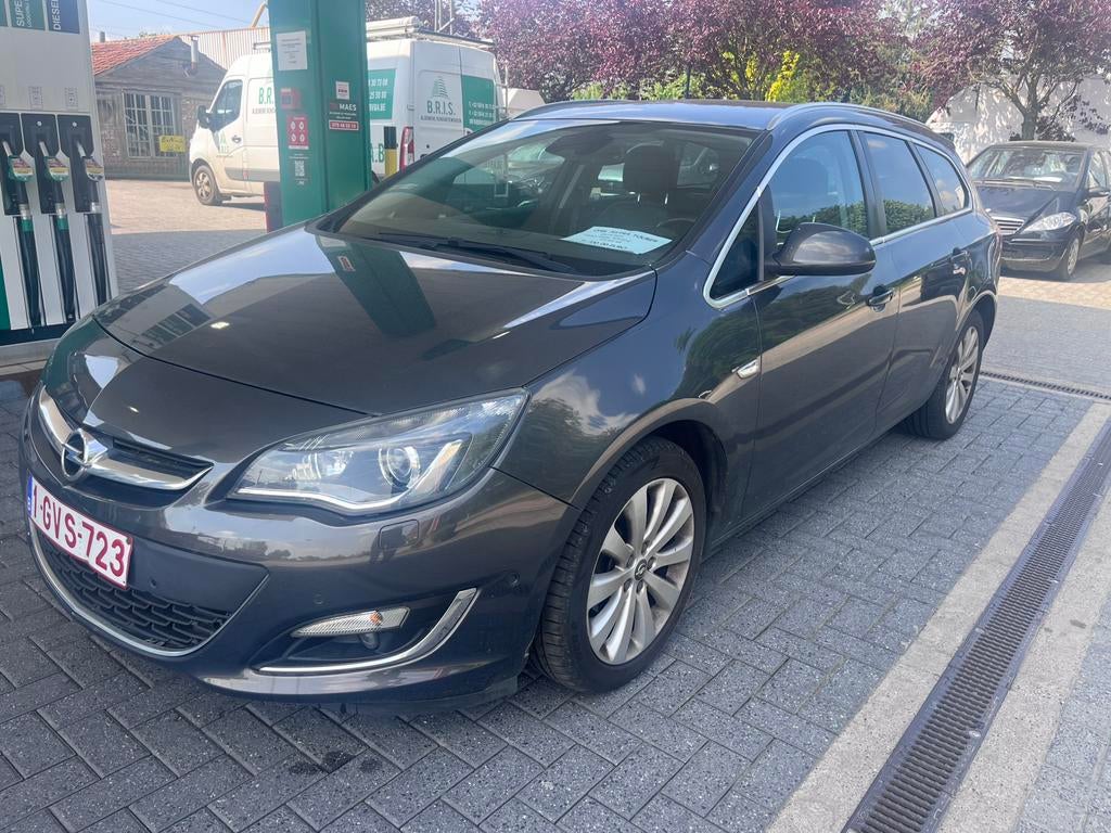 Opel astra 1.4B  115000 km  2015, Autos, Opel, Cuir, Argent ou Gris, Euro 6, Entreprise