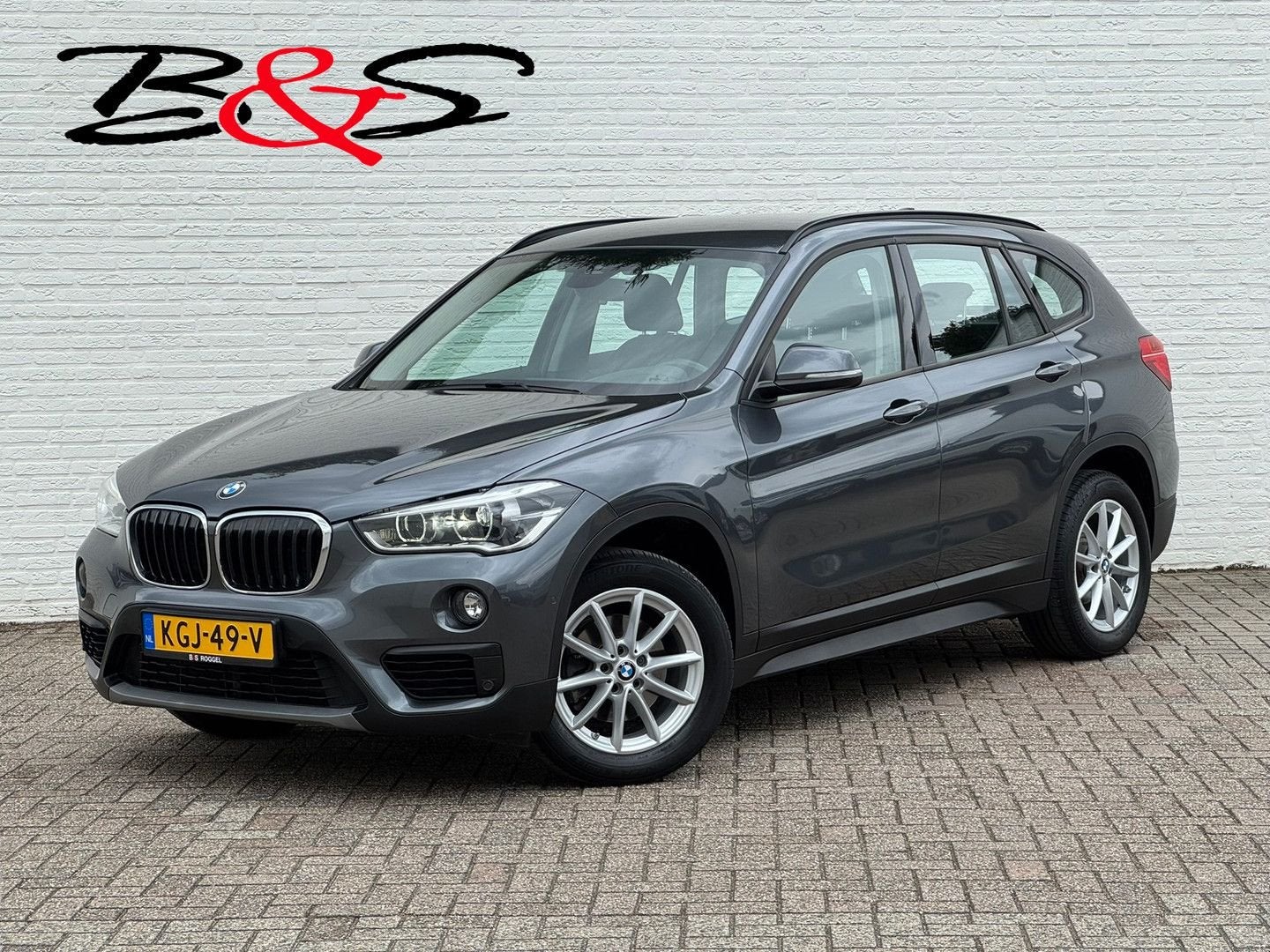 BMW X1 SDrive18i High Executive Camera Trekhaak 1700kg Clima, Auto's, BMW, Zwart, 124 g/km, Bedrijf, SUV of Terreinwagen