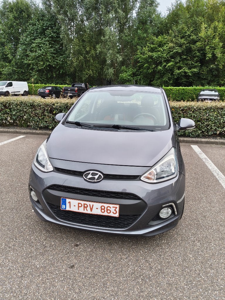 Hyundai i10 - 71.273 km - inschrijvingsjaar 2016, Autos, Hyundai, Argent ou Gris, Achat, 4 portes, Boîte manuelle