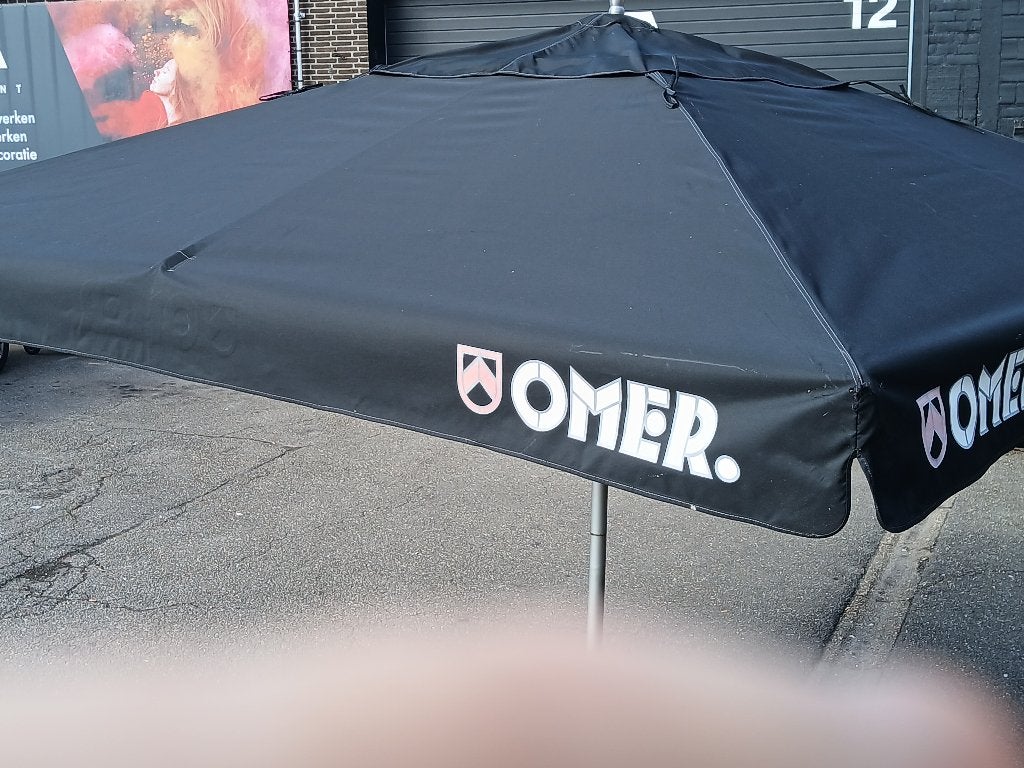 Omer horeca parasol, Ophalen