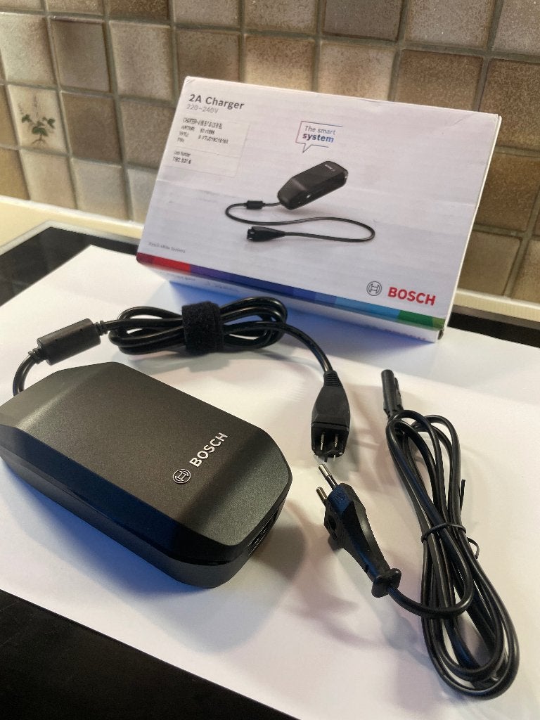 CHARGEUR DE BATTERIE POUR VÉLO ÉLECTRIQUE | BOSCH, Vélos & Vélomoteurs, Comme neuf