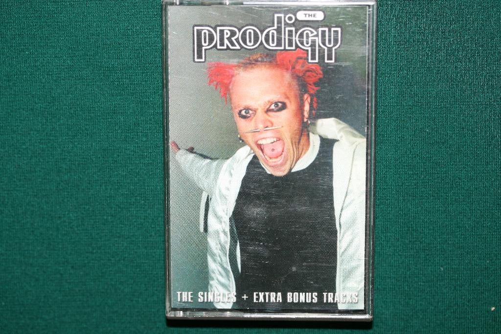 The Prodigy - The Singles - Extra Bonus Tracks, CD & DVD, Cassettes audio, Enlèvement ou Envoi, Utilisé, Dance, 1 cassette audio