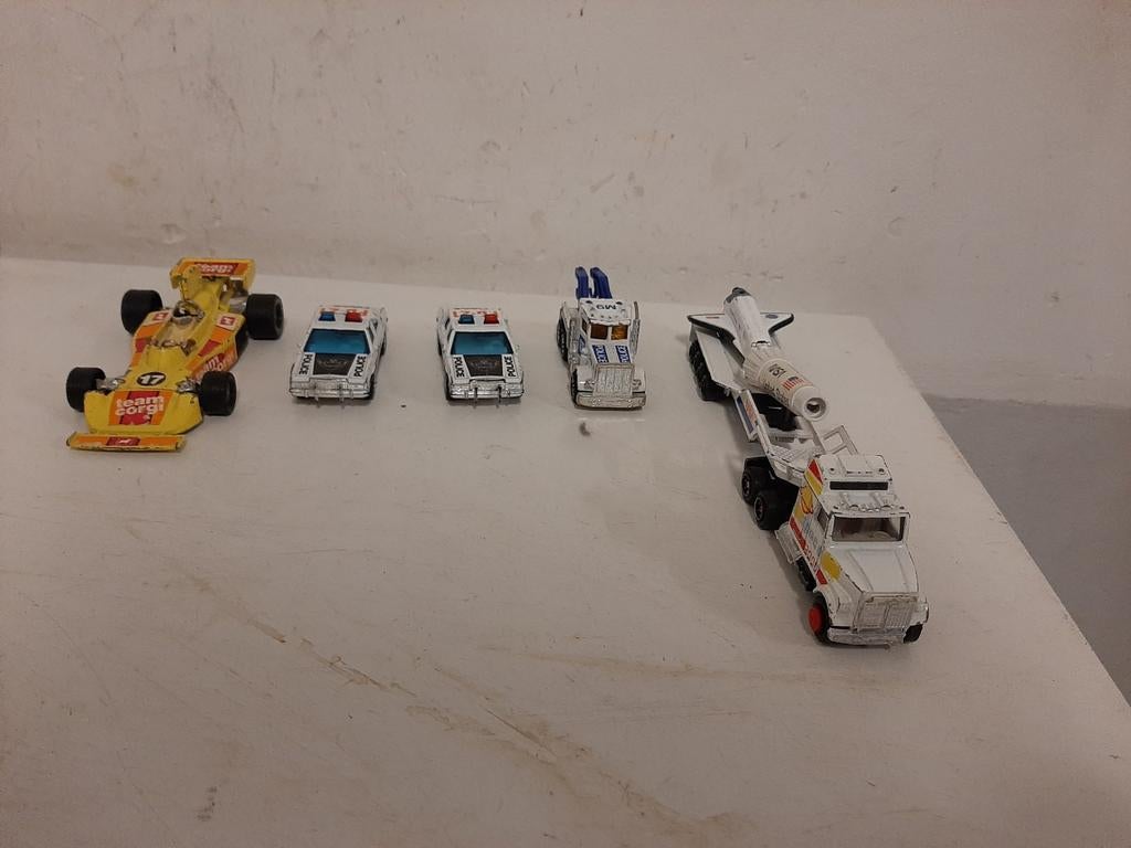 5 verzamel auto's + nasa vrachtwagen, Ophalen