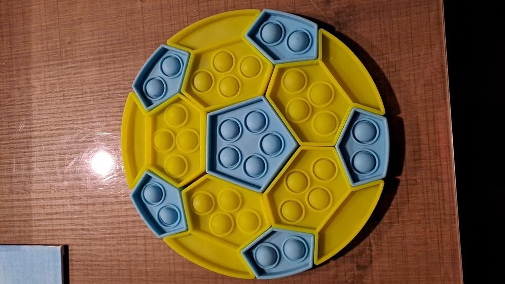 Pop-it puzzel in vorm van bal, Ophalen