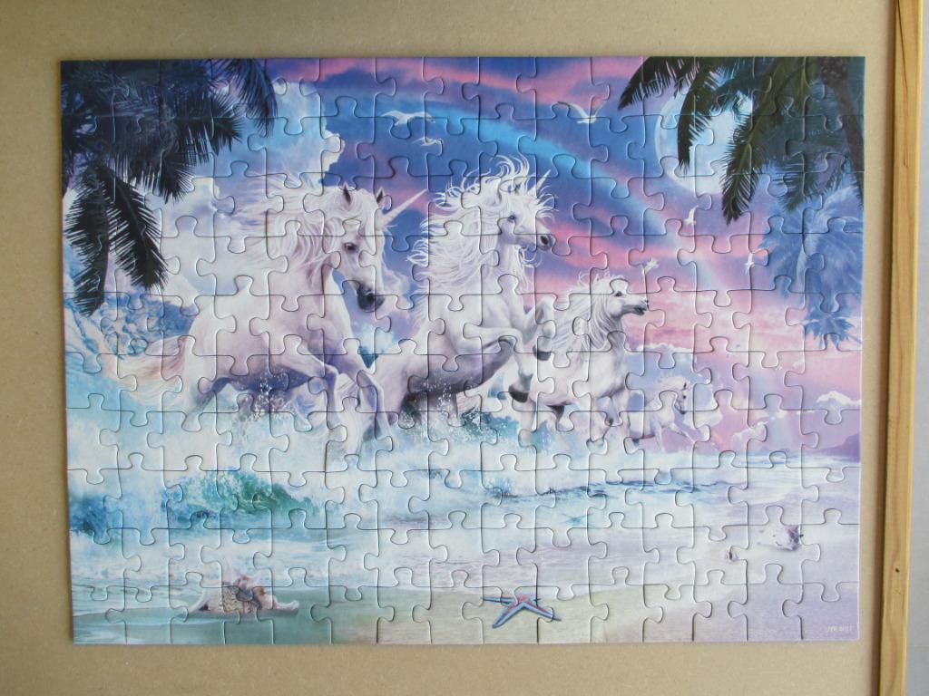 puzzel ravensburger eenhoorns 150, Ophalen of Verzenden, Meer dan 50 stukjes, Zo goed als nieuw, 6 jaar of ouder