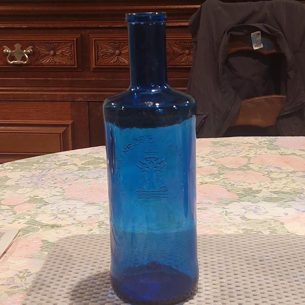 2 blauwe flessen, Ophalen of Verzenden