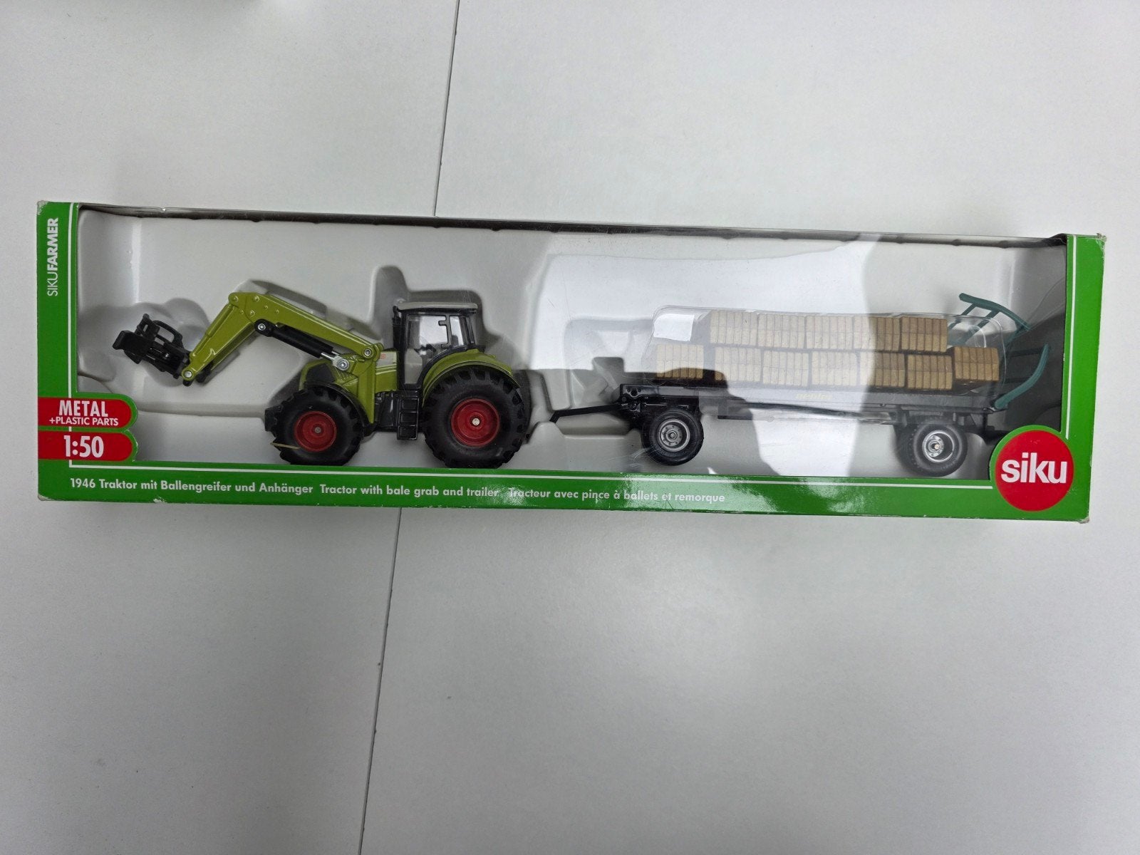 Siku Claas Tractor met aanhangwagen, Ophalen of Verzenden, Zo goed als nieuw